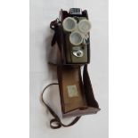 A vintage Eumig cine camera in original leather case