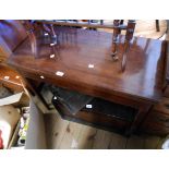 A 90cm 19th Century mahogany and strung fold-over tea table, set on square tapered legs