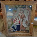 A Victorian framed tapestry depicting a religious scene in faux bird's-eye maple frame