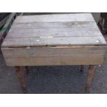 An old pine pembroke table with single drawer, set on turned legs - for repolishing