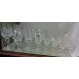 A large quantity of cut crystal drinking glassware including hocks, wine glasses, etc.