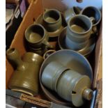 A Langley stoneware tea set comprising nine cups and saucers, milk jug, larger jug and four cereal