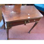 A 77cm late Georgian mahogany fold-over card table with baize inset top, single frieze drawer with