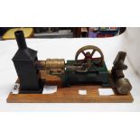 A scratch built model of a Stirling Hot Air oscillating engine set on wooden base with brass plaque