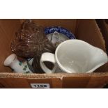 A box containing assorted ceramics and glassware