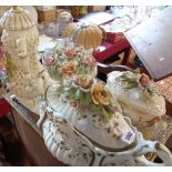 Four large pieces of Capodimonte flower encrusted china comprising two lidded boxes, lidded urn