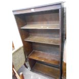 An 80cm vintage oak four shelf open bookcase, set on bun feet