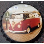 A modern tin bottle top sign with printed VW campervan decoration