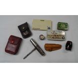 A bag containing a quantity of collectable items including vintage tape measure with spirit level,