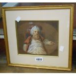 A gilt framed antique watercolour, depicting a seated gentleman wearing a turban - originally oval