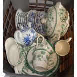 A crate containing a quantity of blue and white onion pattern teaware, etc.