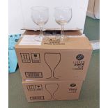 A quantity of twenty four boxed commercial wine glasses