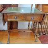 A reproduction drop-leaf table