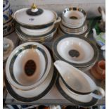 A quantity of Royal Doulton bone china dinnerware in the Carlyle pattern including tureen, serving