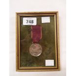 A 1914 American Occupation of Veracruz Mexico medal - framed and with silver plated finish on