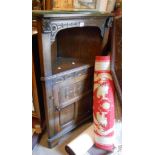 A 74cm vintage Bevan Funnell (Reprodux) oak freestanding corner cabinet with open shelf over further