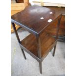 A 1920's Georgian style mahogany two tier table with drawer under, set on square supports