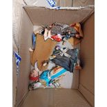 A box containing a small quantity of vintage costume dolls