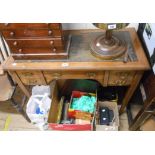 A 92cm Edwardian walnut and strung writing desk with leather inset top, central frieze drawer and