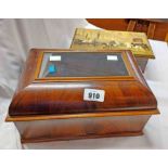 A late 19th Century domed lift-top table cigar box with inset glass window to lid and ebony