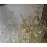 A cut glass spirit decanter of square form with a ceramic brandy label - sold with six tumblers, a