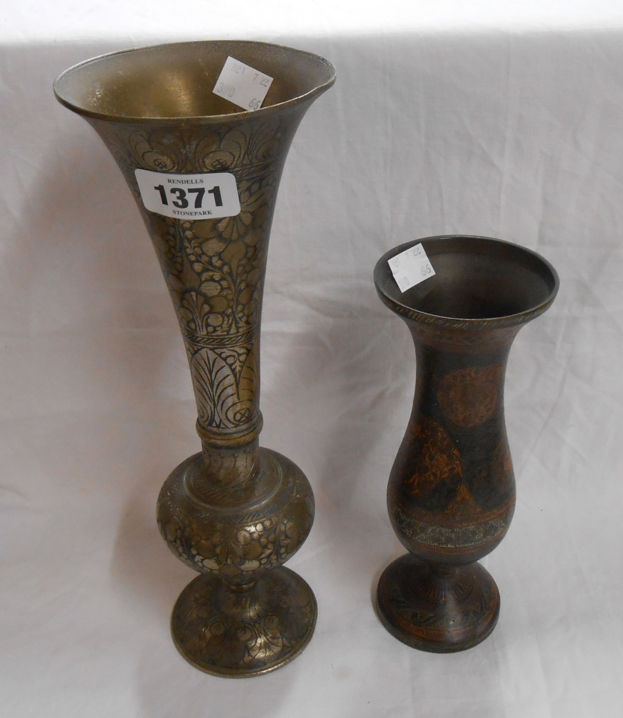 A 20th Century Eastern brass vase with chased decoration and silvered finish - sold with a smaller