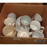 A box containing a quantity of Royal Commemorative mugs, cups and saucers, etc.