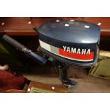 A Yamaha 4AS 4 horse power outboard motor (under 20hrs since professionally serviced) with fuel can