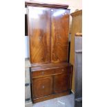 A 92cm 20th Century Waring & Gillow reproduction mahogany and cross banded two part cabinet with