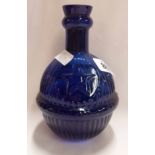 A Victorian blue glass Star brand fire grenade extinguisher with contents and stopper