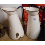 Two old enamel milk jugs