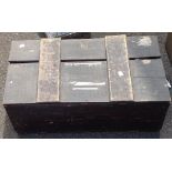 A black painted wood lift-top chest