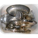 A box containing a quantity of silver plated items including a putto pattern candlestick, hot