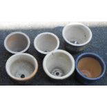 Six medium size glazed pottery garden pots