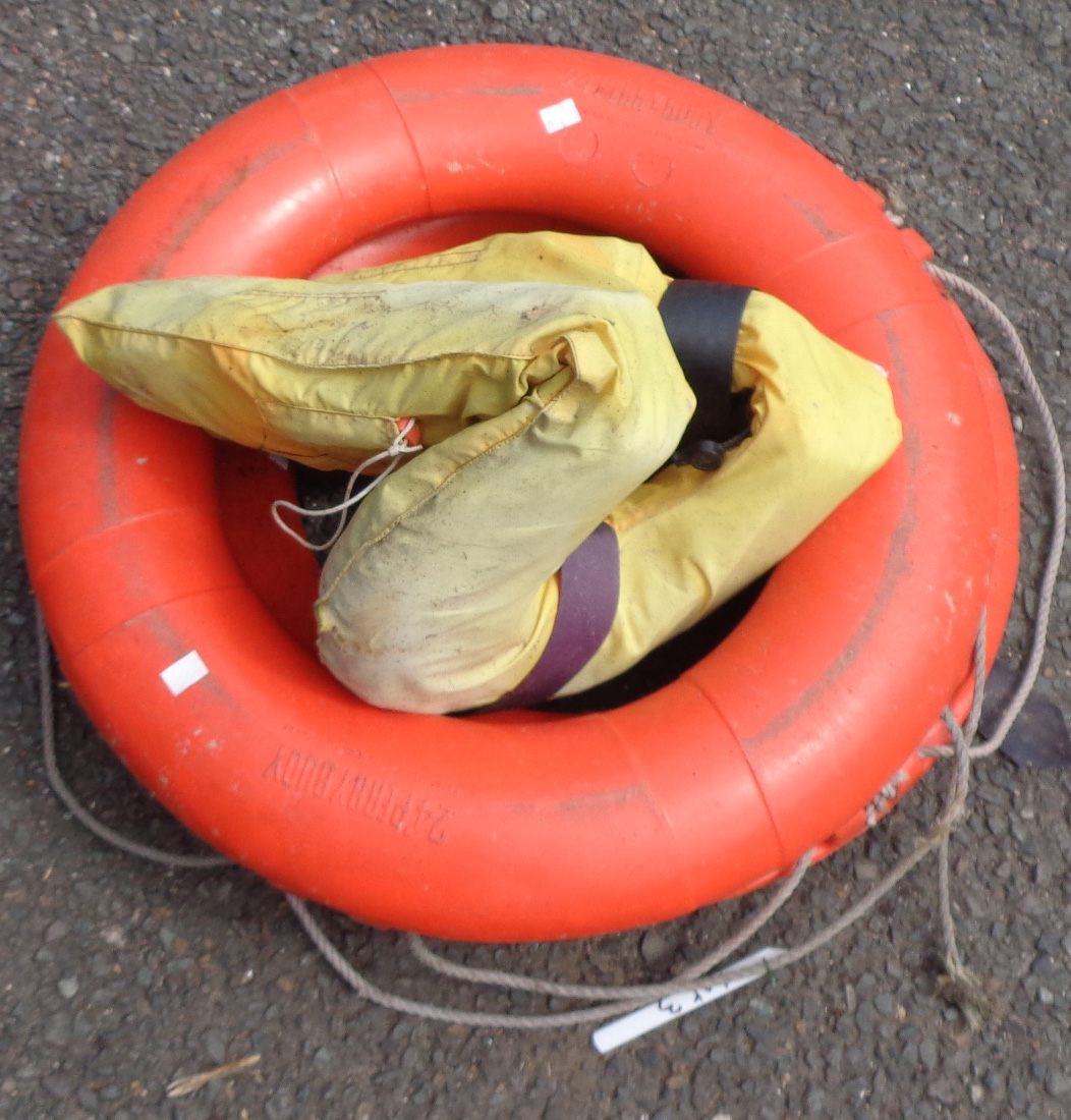 A pair of 24" Perry Buoy lifebelts - sold with a life jacket