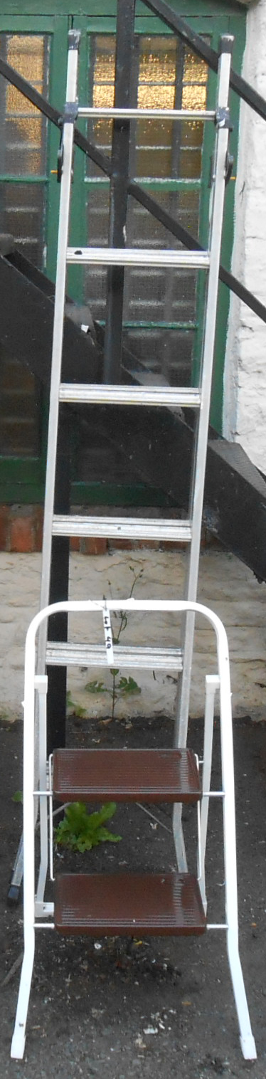 A folding metal step ladder - sold with a set of folding steps