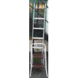 A folding metal step ladder - sold with a set of folding steps