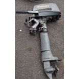 A Suzuki DT4 4 horse power outboard motor - for spares/repairs