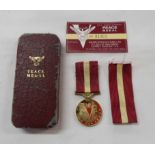 A modern reproduction Peace medal by Award Productions Ltd. with original box and certificate card