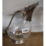 A 24.5cm high silver plated mounted duck pattern glass decanter with flip-top