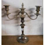 A 38cm Garrard & Co. silver plated twin branch three light candelabrum with flambeau finial,