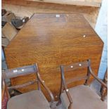 A 1.33m old rustic oak octagonal dining table with floral carved decoration to frieze, set on