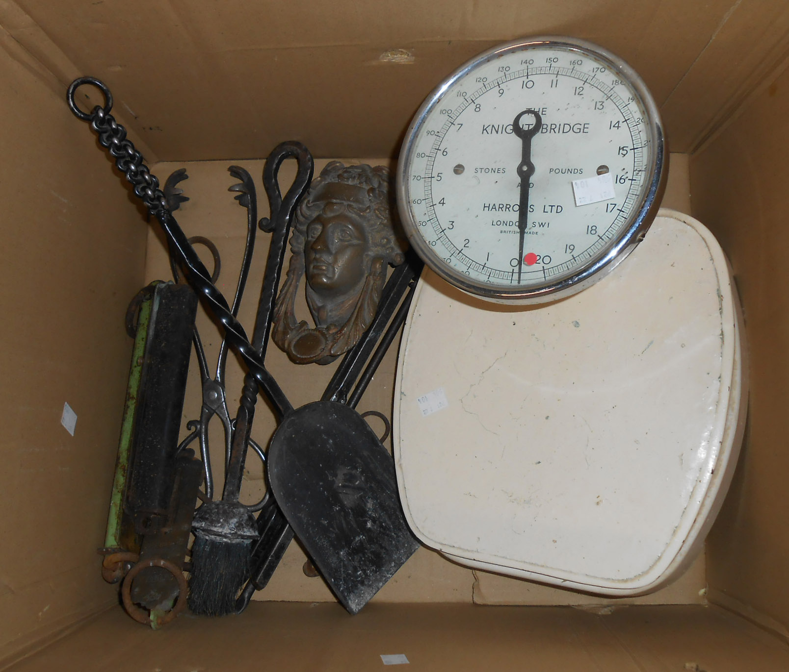 A box containing a quantity of assorted metal and collectable items including The Knightsbridge