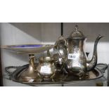A silver plated four piece tea set with engraved decoration on an associated tray - sold with a