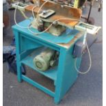 A vintage Myford electric belt-driven table planer with blade guard