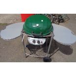 A modern Uniflame gas barbecue with drip bowl