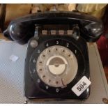 A vintage black telephone