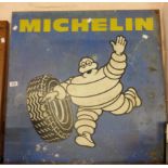 A vintage printed tin Michelin advertising sign