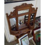 A modern far eastern hard wood hall mirror in the Victorian style with multiple plates, flanking