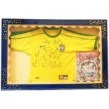 A box framed and glazed signed Brazil football shirt (size S) for the game Exeter City V Brazil